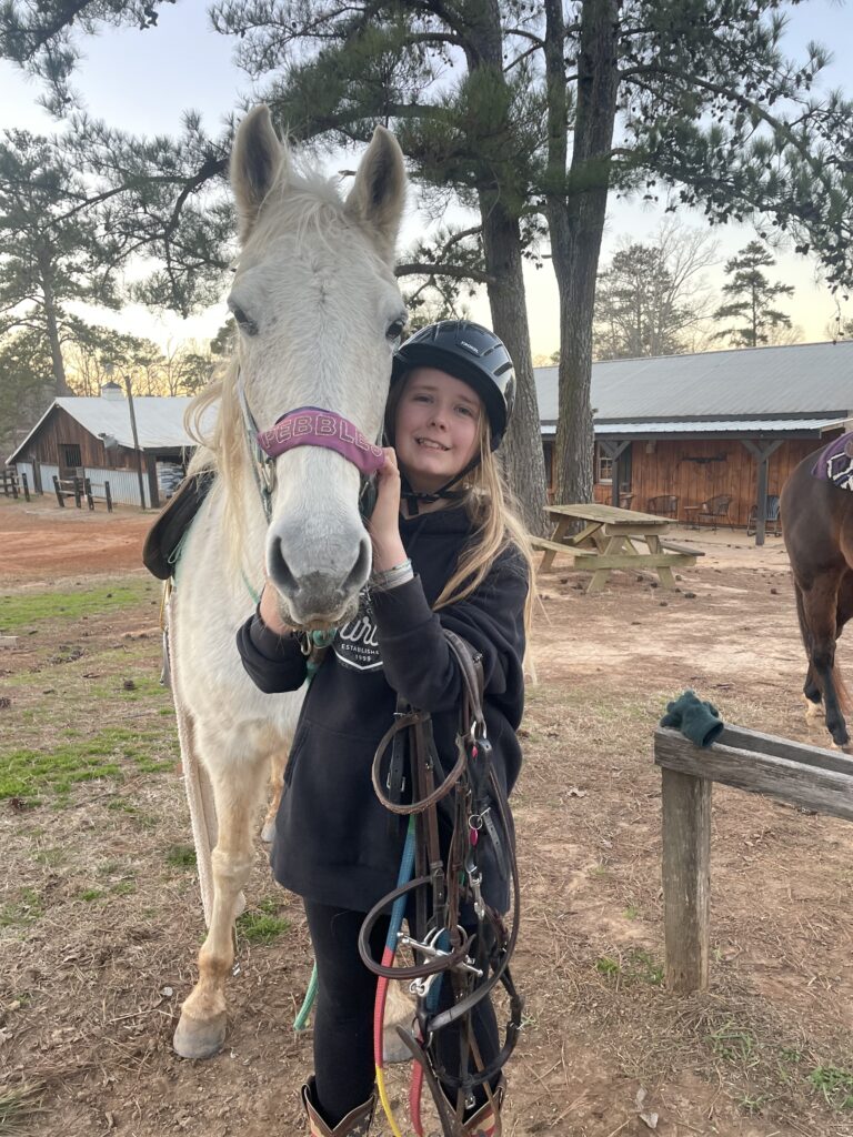 Student with a horse